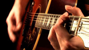 strumming-acoustic-guitar_2jpg