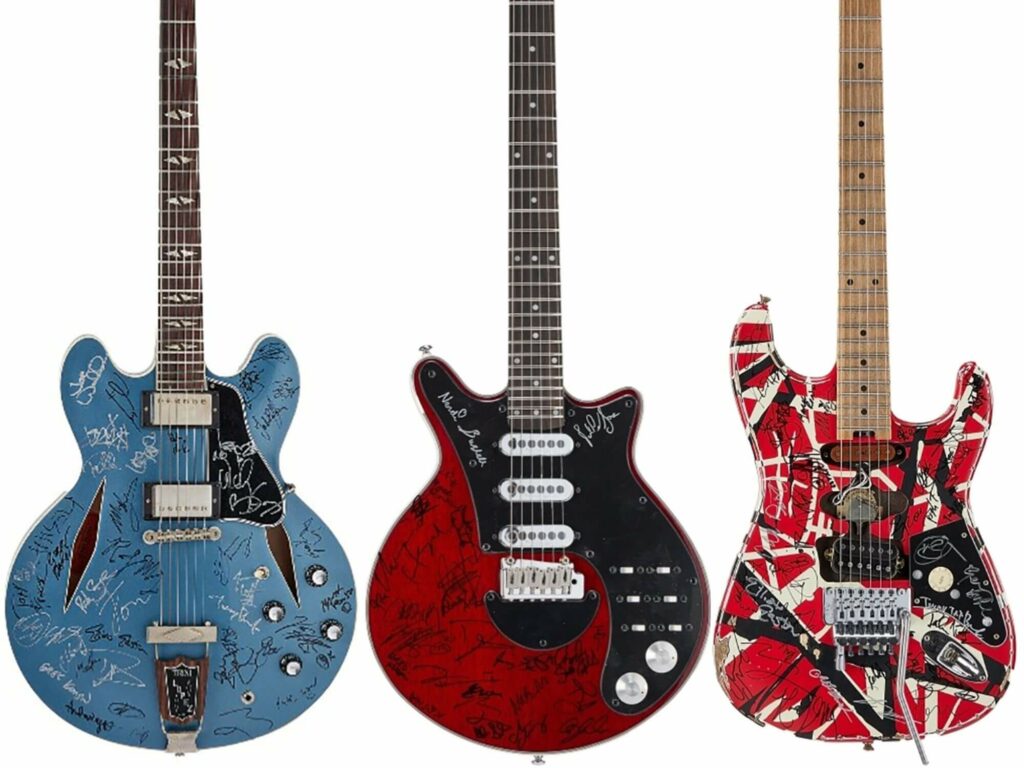 Signed guitars from the Taylor Hawkins Tribute to be auctioned for