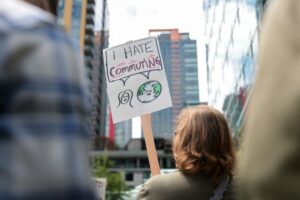 A-protester-holds-a-22I-hate-commuting22-sign-in-front-of-Amazons-Seattle-HQ-1