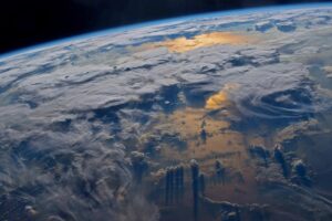iss_earth_linb_clouds_sunse