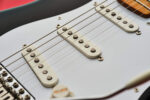 Why do guitars have pickup covers and what do they actually do to your tone?