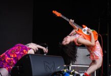 Guitarist apologises after guitar-throwing stunt sends audience member to hospital